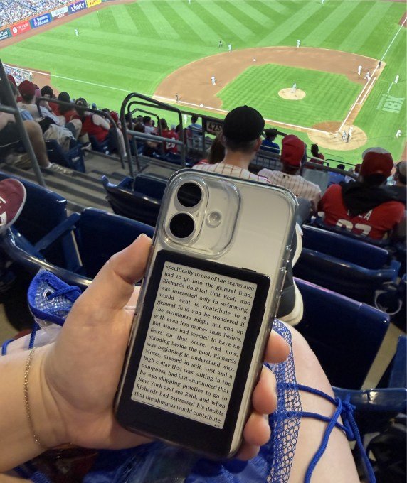 The XTeink X3 being used in a crowded stadium